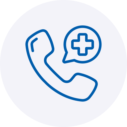 A blue line-art icon depicting a telephone handset next to a speech bubble containing a medical cross, representing emergency services or a medical helpline. The minimalist illustration is set against a soft, light grey circular background.